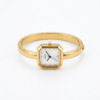 Elegant gold square bangle watch for women with a minimalist white dial and polished bracelet.