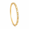 Aurora Prism Kada featuring baguette and round crystal accents in a gold-tone finish.