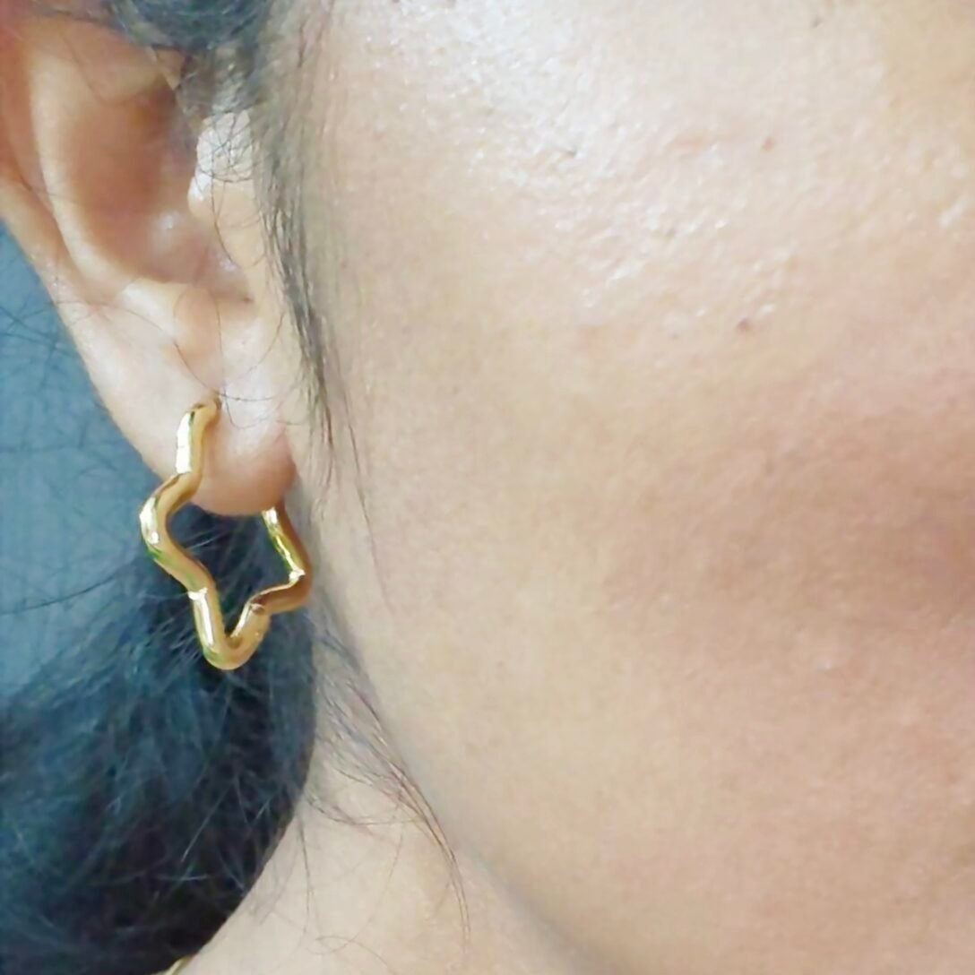 Elegant wavy star gold hoop earrings with polished finish for women