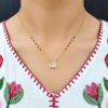 Golden Radiance Solitaire Mangalsutra with rectangular crystal pendant and black beads