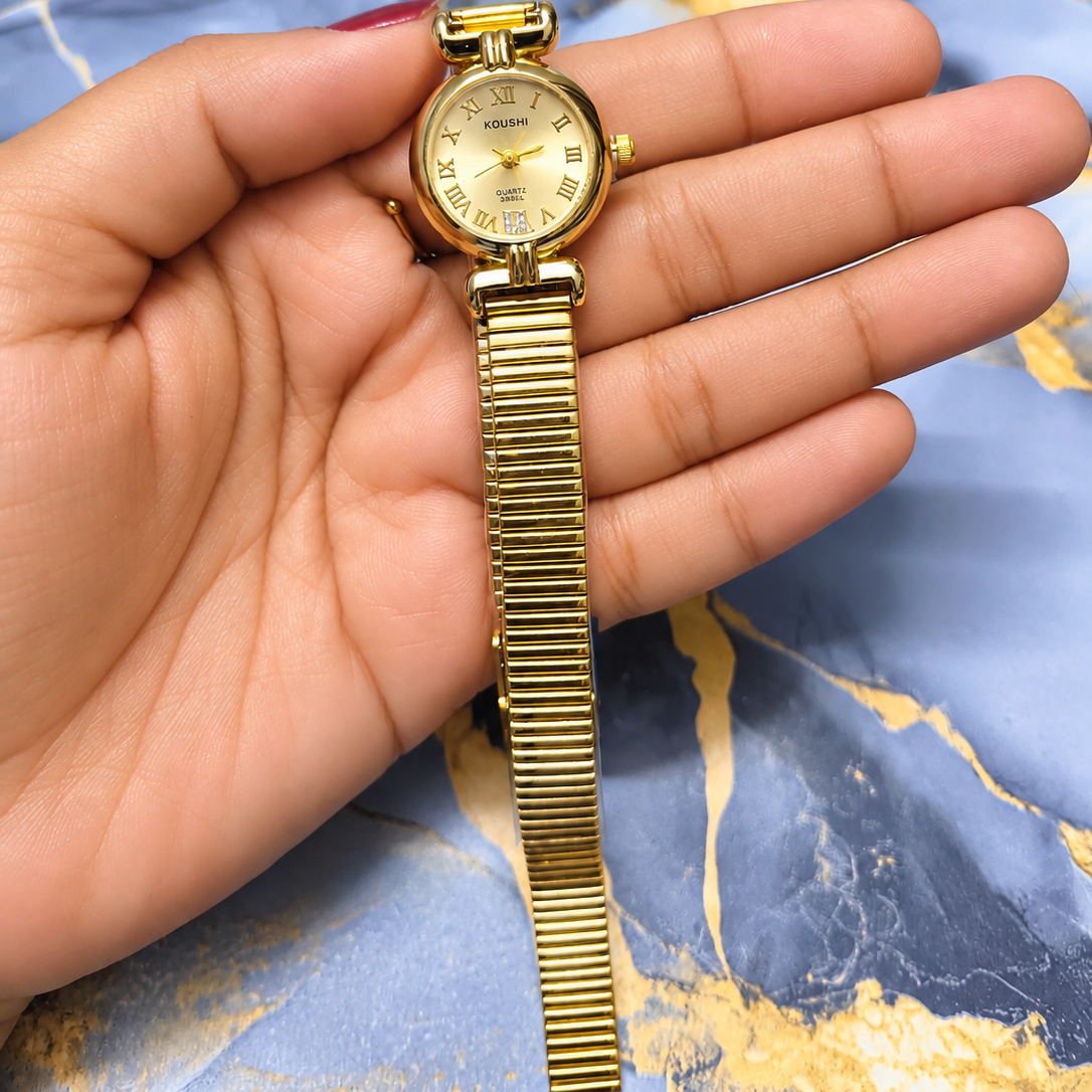 Golden Royale Classic Watch for Women with Round Roman Numeral Dial and Elegant Gold-Tone Bracelet Strap